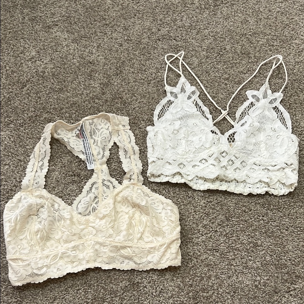 Pair of free people lace bras. Never worn. Size small